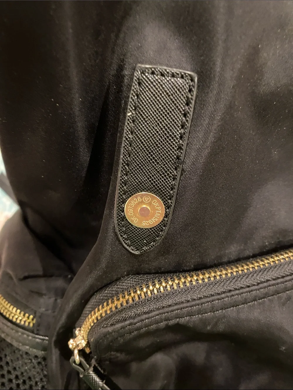 Prune Black Backpack with Gold-Tone Accents